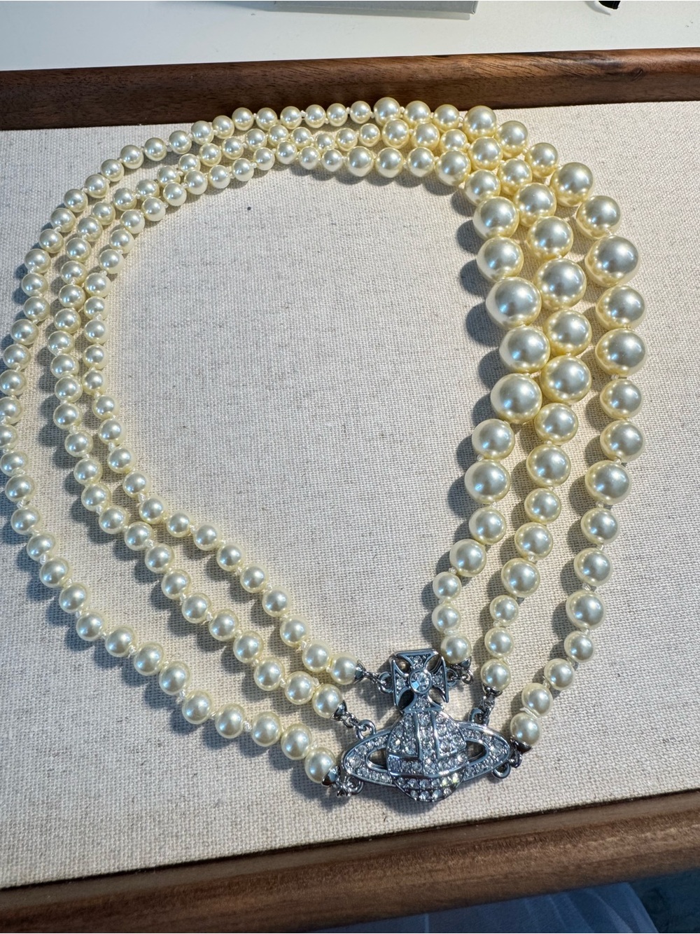 Vivienne Westwood Ivory Multi-Strand Faux Pearl Necklace with Orb Logo